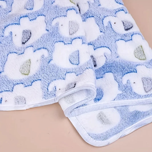 Close up of plush flannel fabric with cute elephant print pet blanket