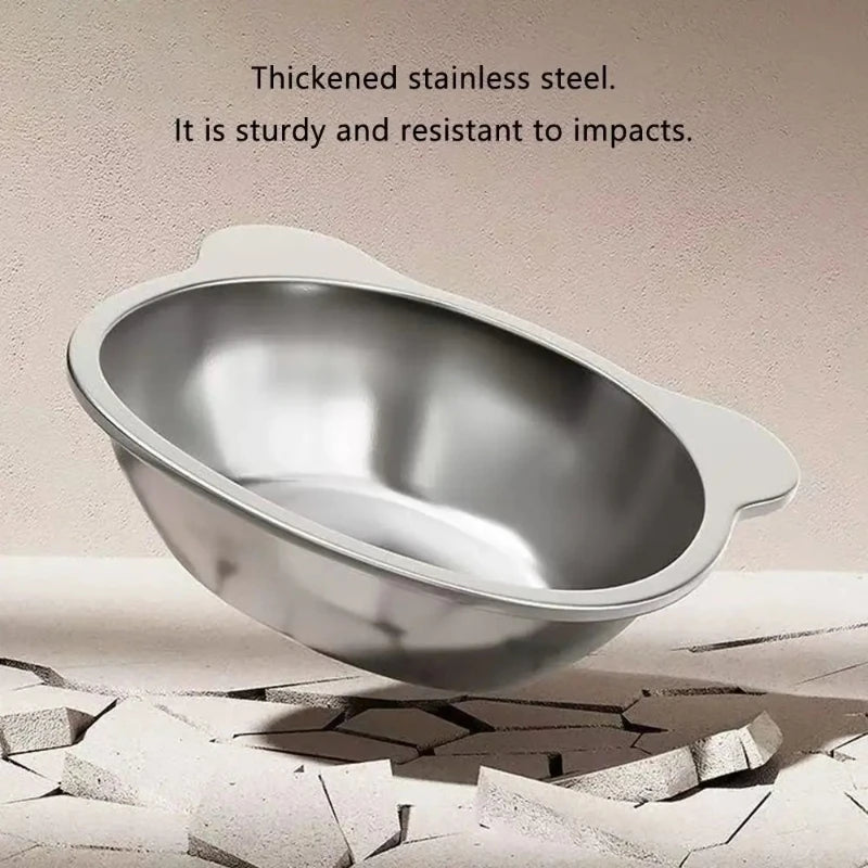 Thickened stainless steel pet bowl displayed on broken tile showing impact resistance
