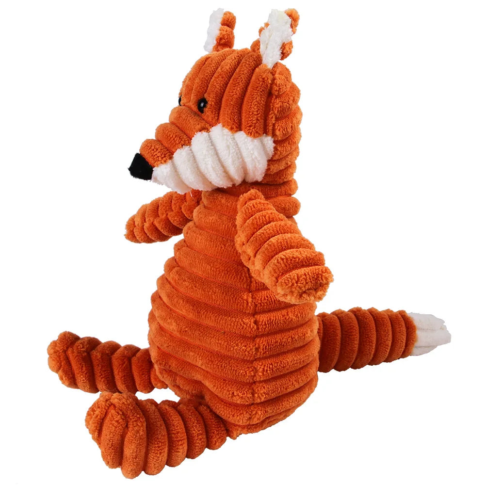 Orange plush fox dental chew toy for dogs side view