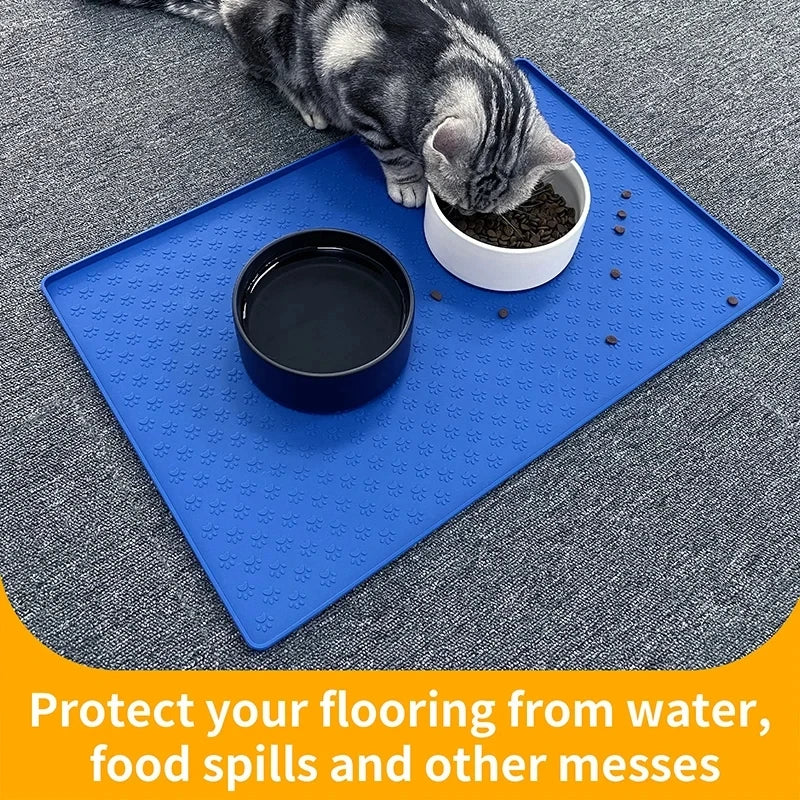 cat using gray silicone feeding mats in modern home