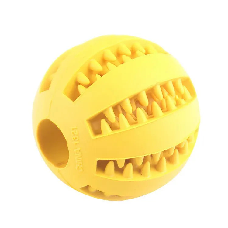 Yellow rubber interactive treat ball for dogs mental stimulation and dental care
