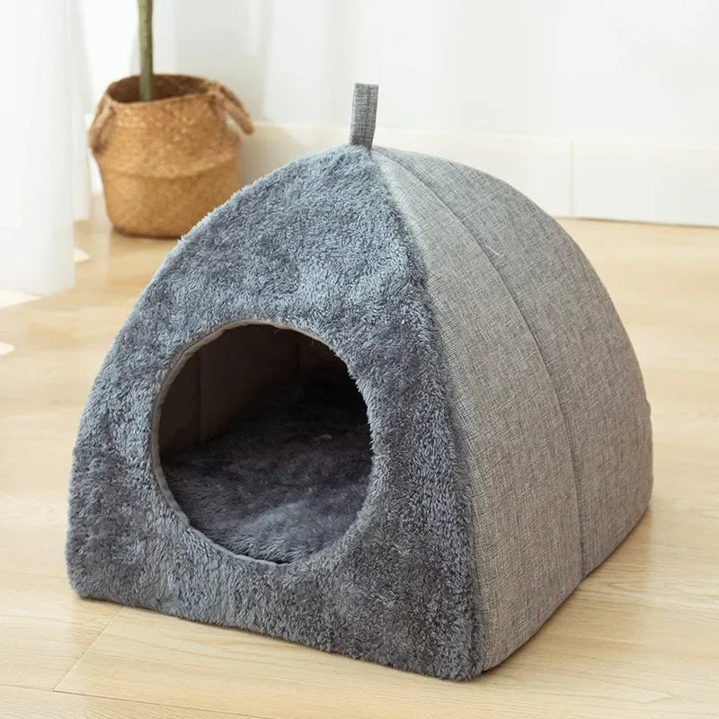 Gray felt triangle cat bed standalone on wooden floor minimalist design