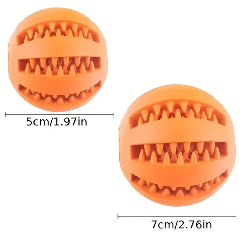 Two orange treat dispenser balls showing size comparison 2 inch and 2.8 inch diameter