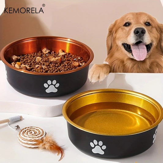 Golden retriever behind black and gold stainless steel dog bowl with paw print design