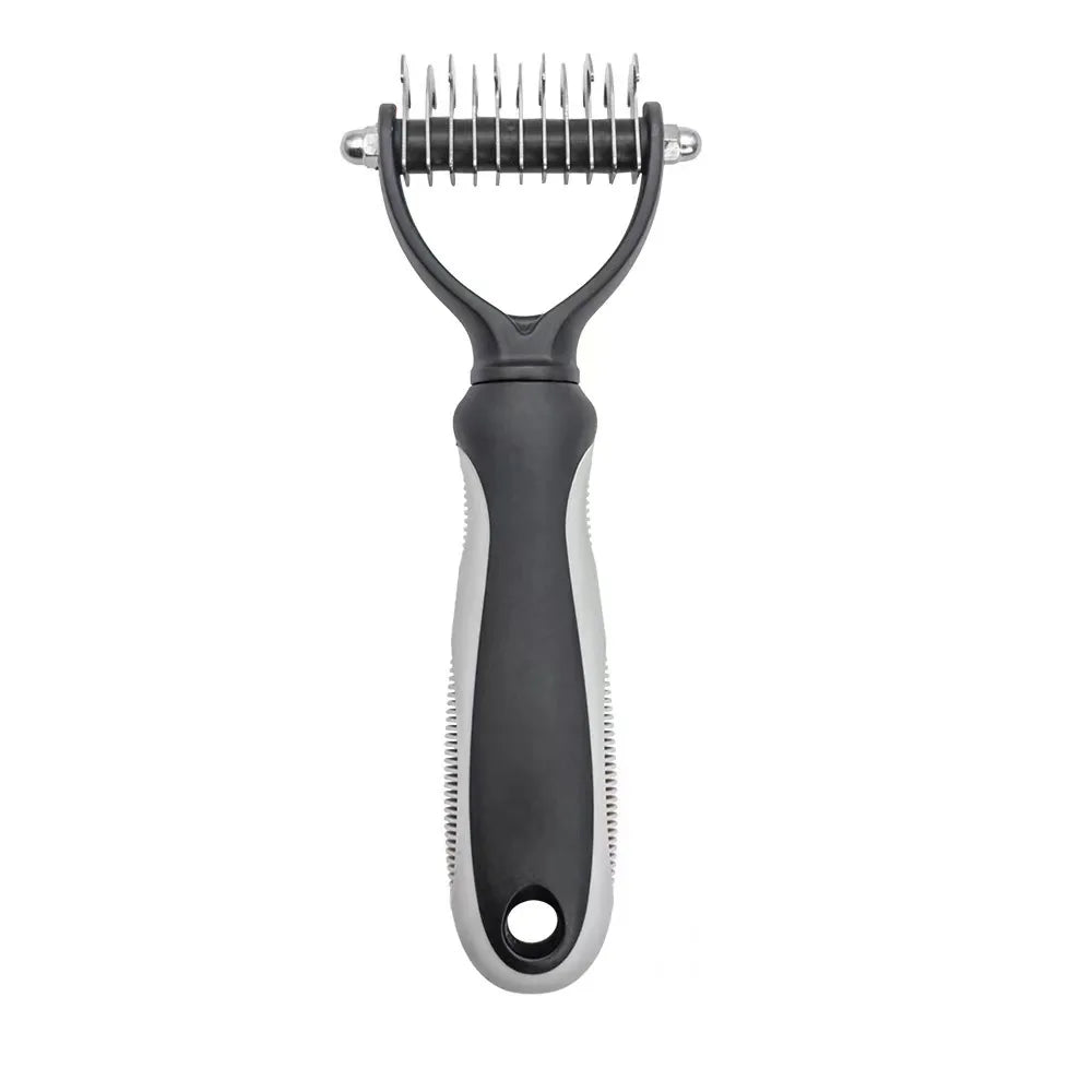 Black deshedding brush displayed on white background pet grooming tool