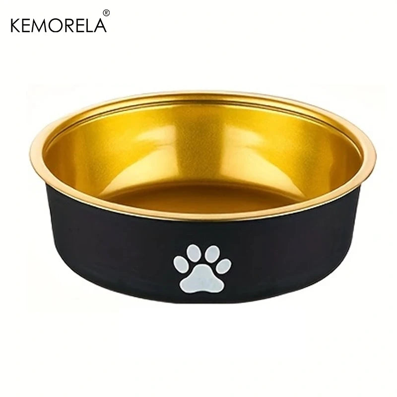Black stainless steel dog bowl with gold interior and white paw print front view