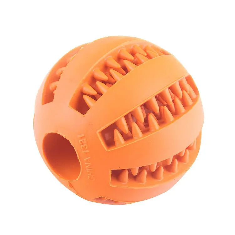 Orange rubber chew ball close up showing textured surface for teeth cleaning