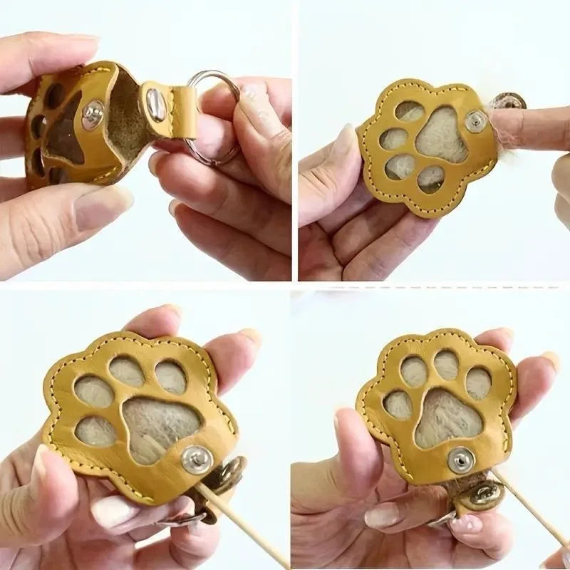 Three leather paw print keychains in beige brown and red gold hardware