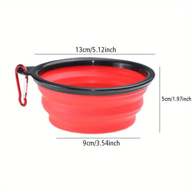 Red foldable silicone travel bowl with black rim and red clip