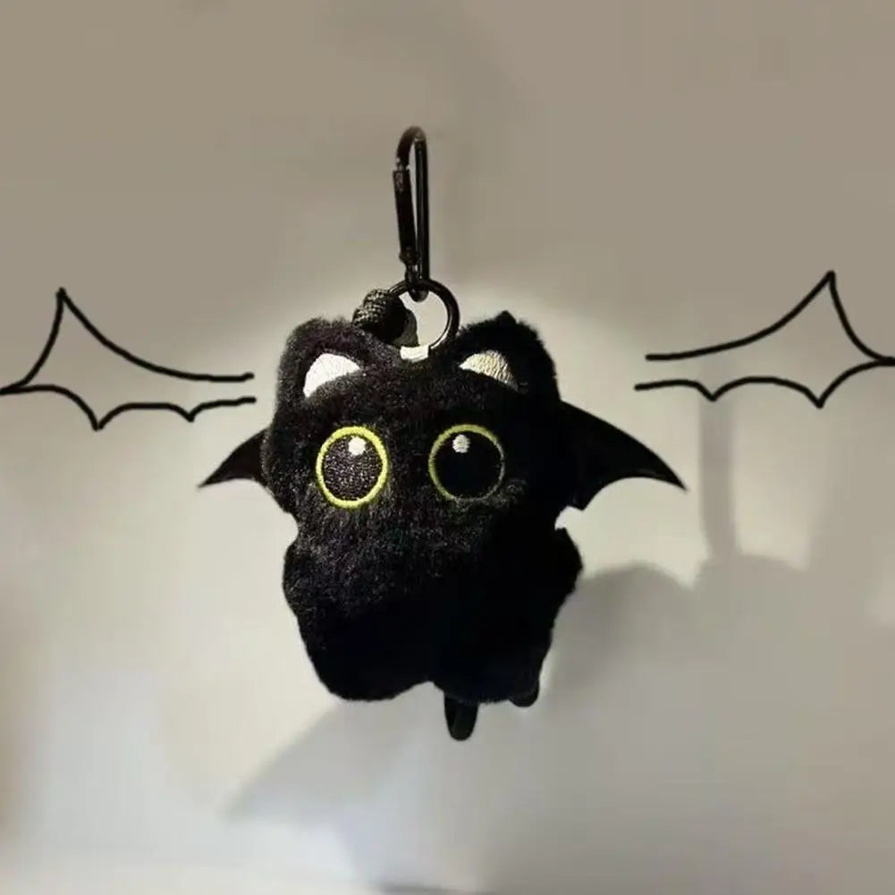 Black plush bat-wing cat keychain illustration