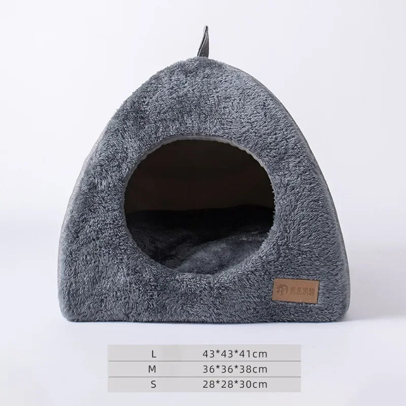 Triangle cat nest with removable cushion pad displayed from above