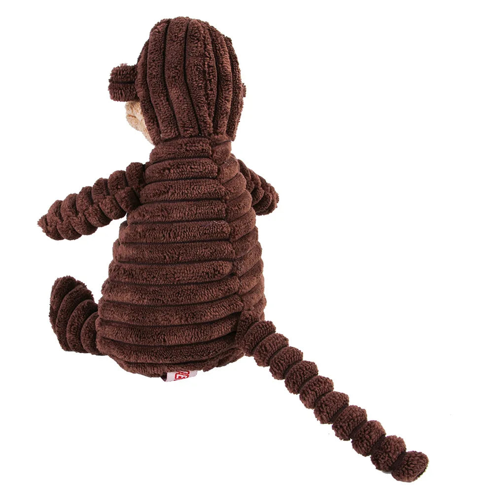 Brown plush monkey dental chew toy for dogs side view